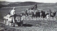 Thumbnail image: Vehicles in a field overlooking Sidi N'sir 