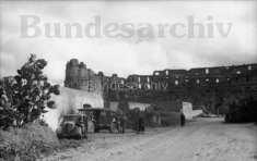Thumbnail image: German vehicles parked in El Jem