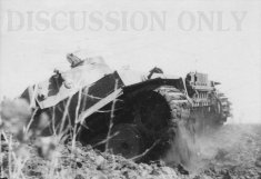Thumbnail image: Tiger 300 climbs out of a trench