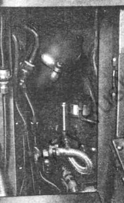 Fuel pump access panel for the HL210