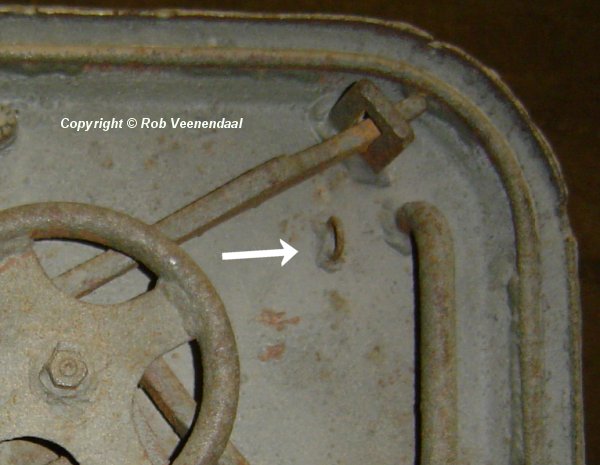 Loader's hatch cable attachment