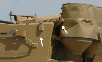 Support arms for rear S-mine launcher